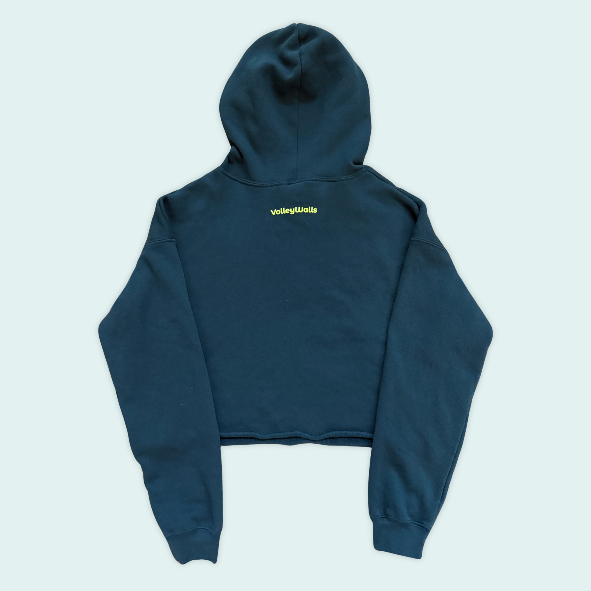 blue-green cropped hoodie with yellow-green volleywalls logo near the neckline on the back.