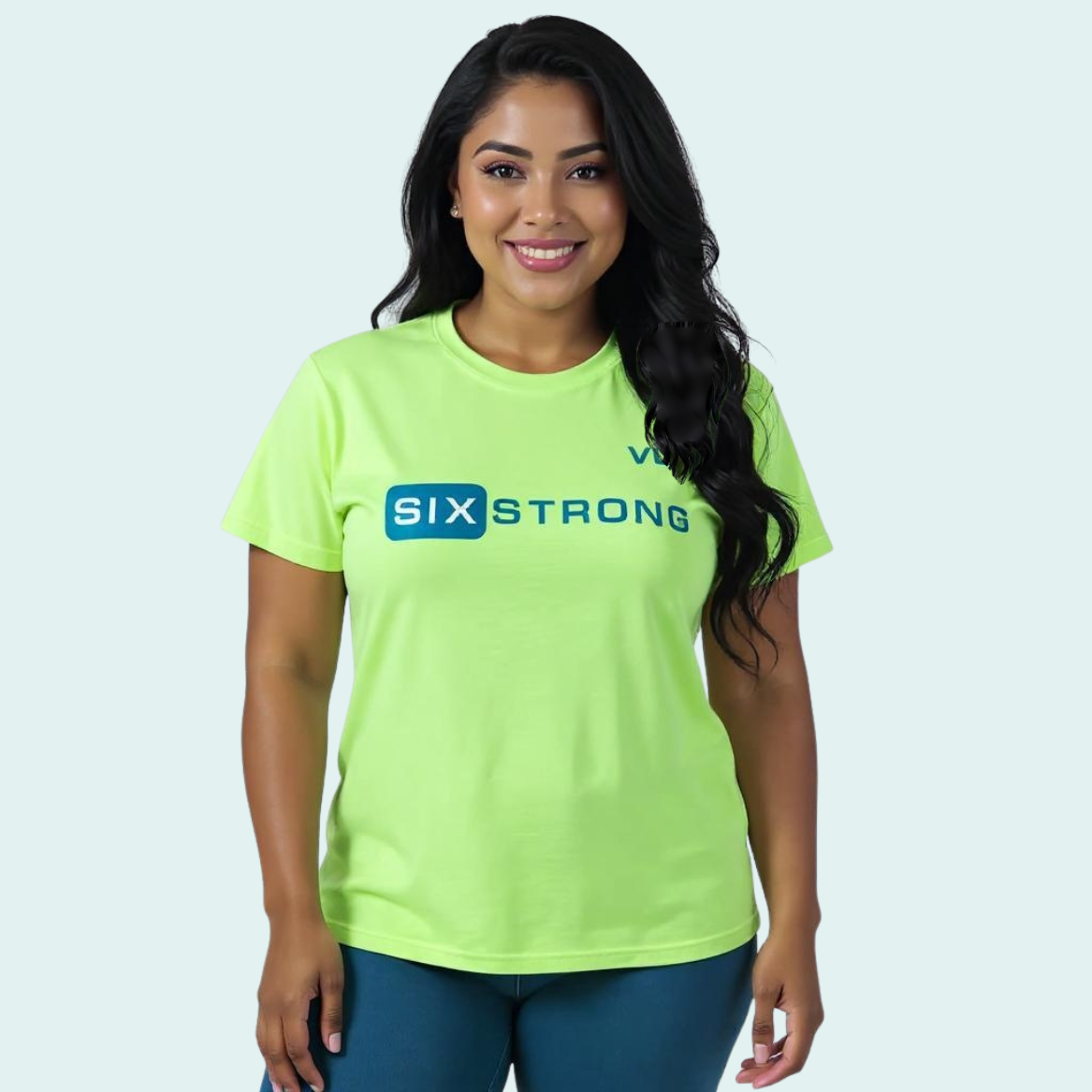 Female wearing a lime green-yellow t-shirt with dark green 'Six Strong' t-text across the front and a dark green VW logo on left chest