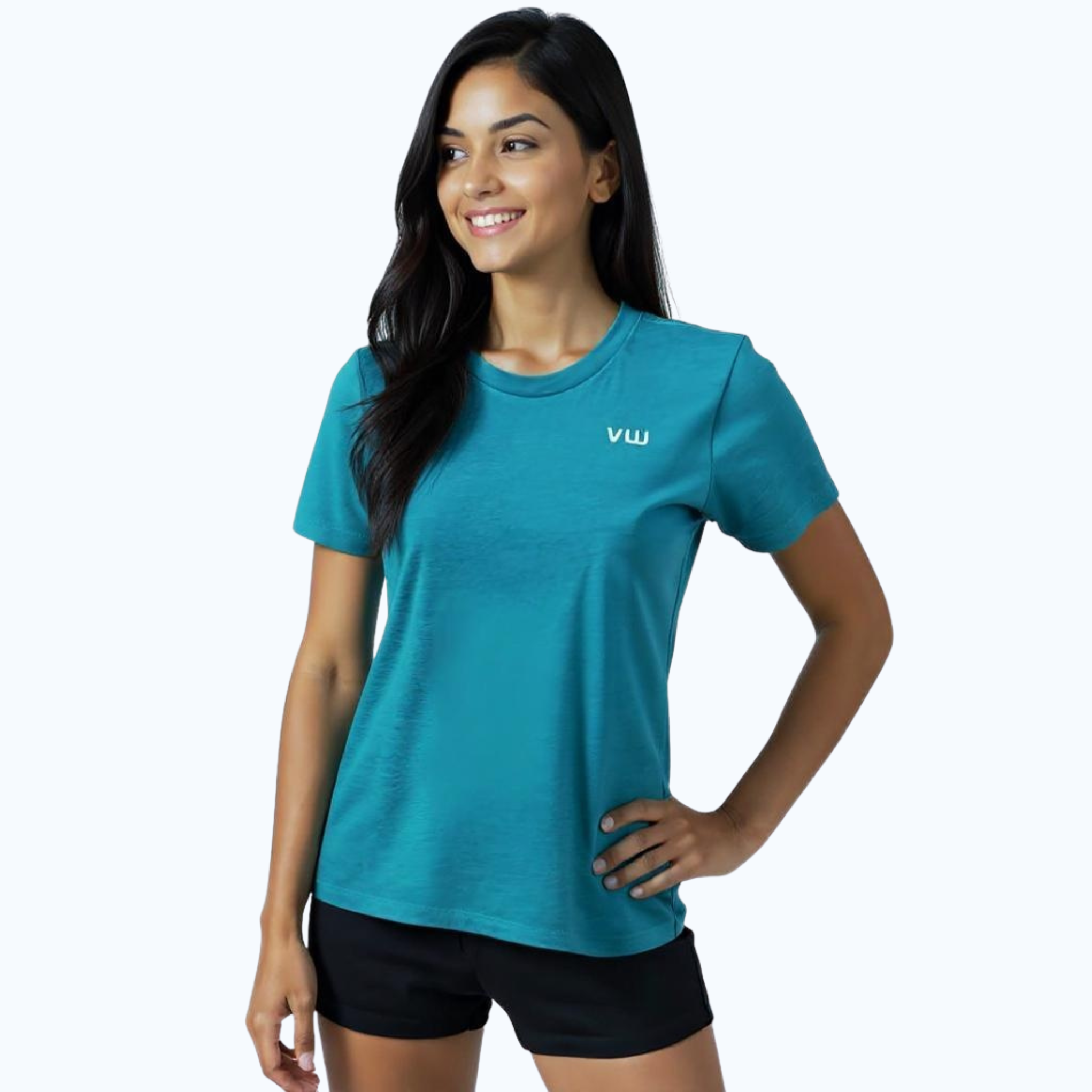 Female wearing a teal t-shirt with a white VW logo on left chest