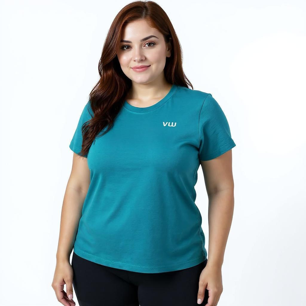 Female wearing a teal t-shirt with a white VW logo on left chest